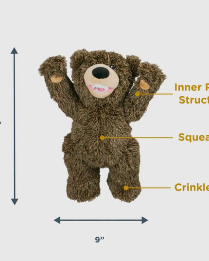 Stuffed bear toy with labeled features and dimensions on a gray background